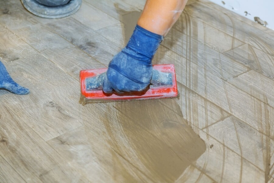A man with an equipment for stamped concrete